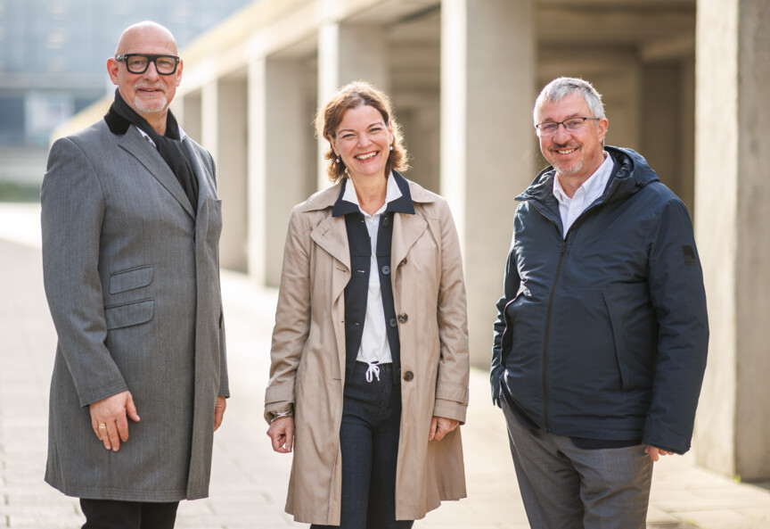 Gruppenbild der Geschäftsführung, die aus zwei Männern und einer Frau besteht.